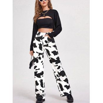 Imagem com calça com estampa de vaca e backless top