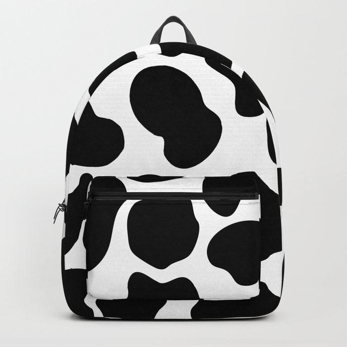 Imagem com mochila com estampa de vaca