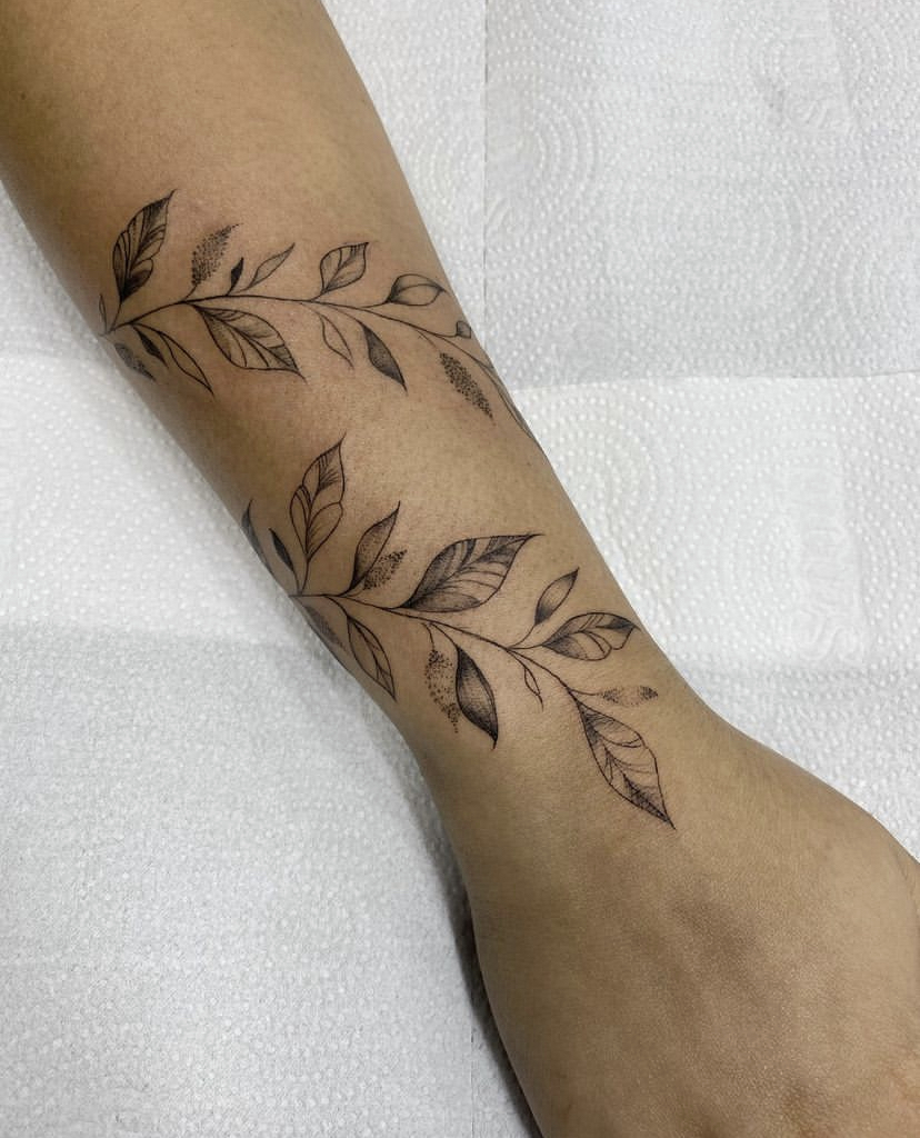 Imagem com tatuagem de ramo de louro