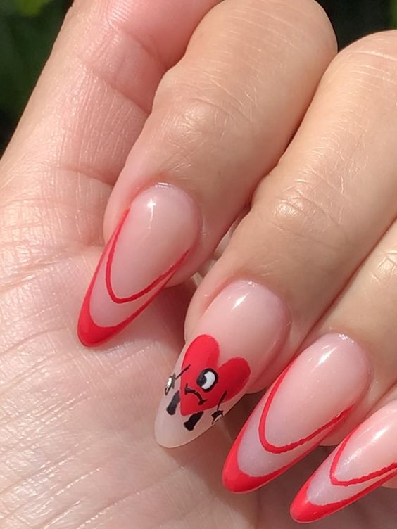 Imagem com Unhas Vermelho com Preto Nudes com nail art de coração e francesinhas delicadas