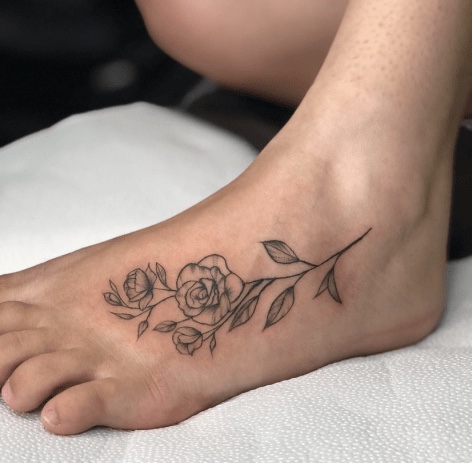 Imagem Com Tatuagem De Flor No Pé Com Rosa