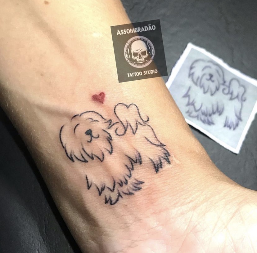 Imagem Com Tatuagem No Pulso Homenagem Aos Animais De Estimação