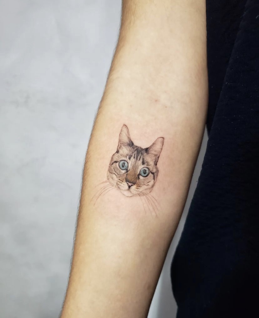 Imagem Com Tatuagem Pequena No Braço De Homenagem Ao Pet