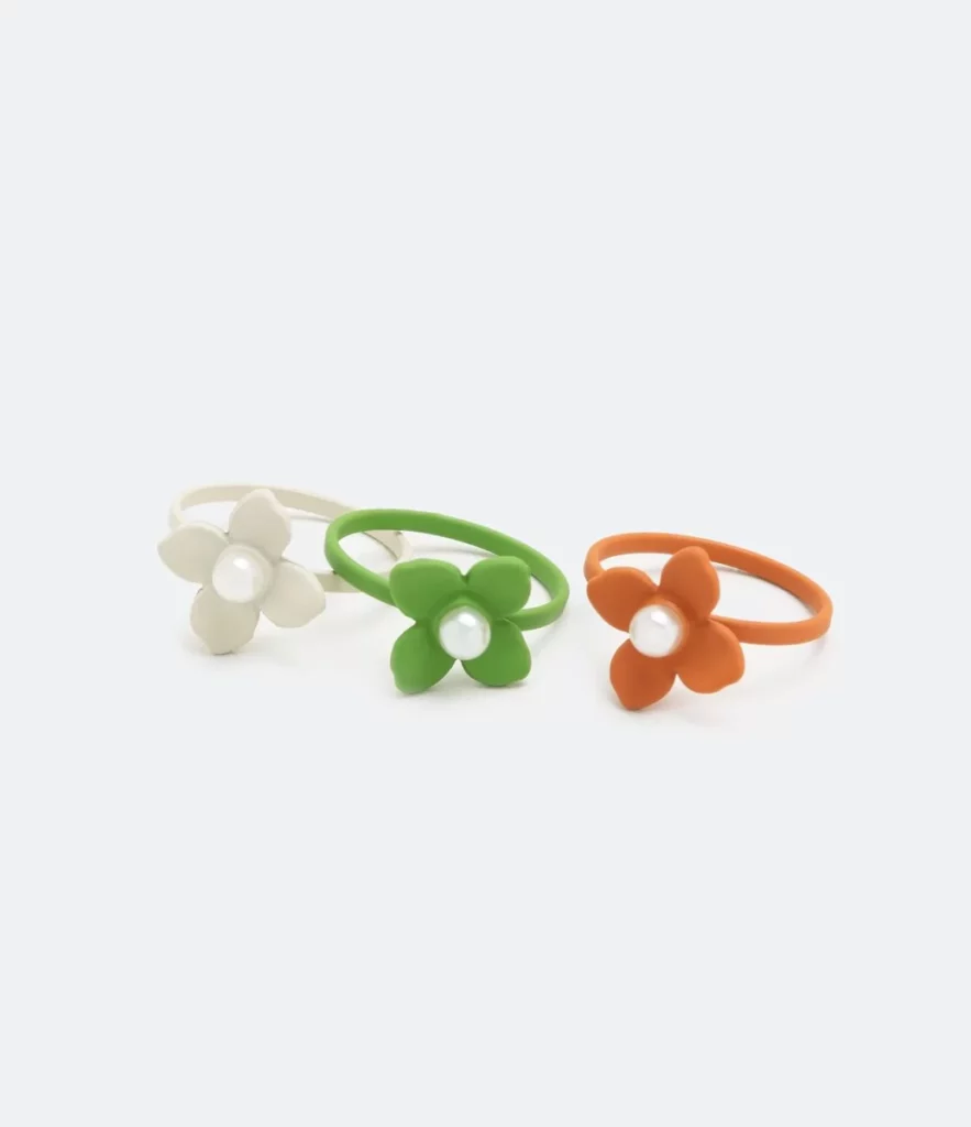 Imagem Kit Três Anéis Em Plástico Com Formato De Flores Multicores