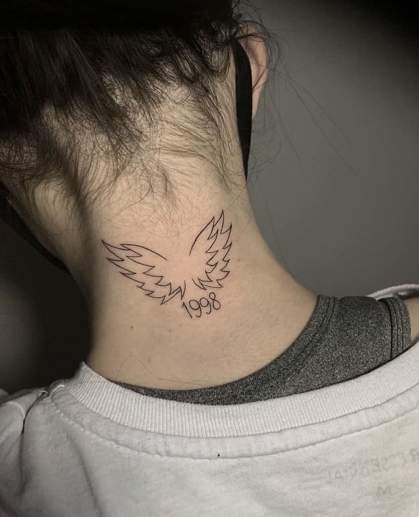 Imagem Com Tatuagem De Data E Asa De Anjo